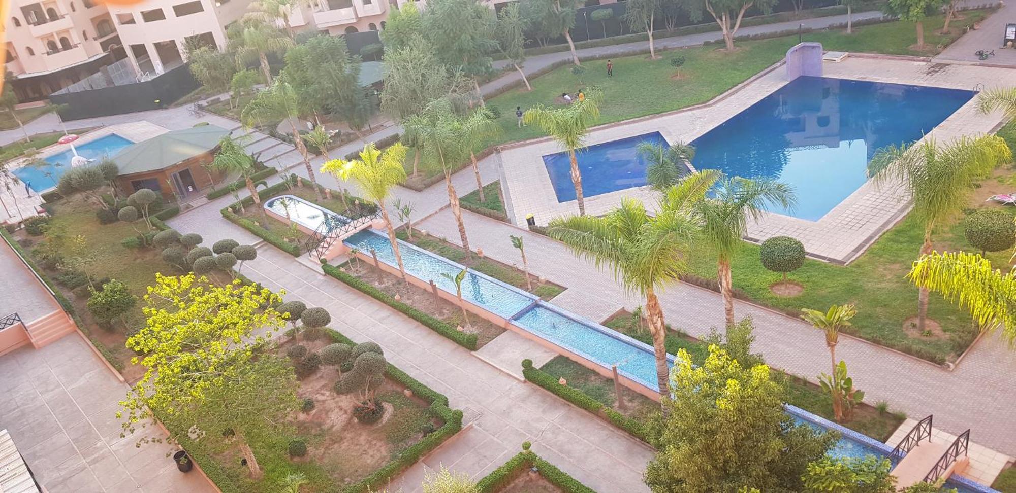 Un Moderne Chic Appartement Vue Sur Piscine Marrakesh Exterior photo